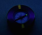 Luminescent Paperweight Compass in the Dark