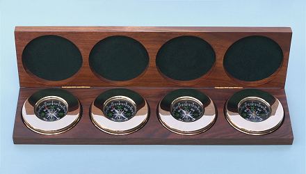 Four Large Paperweight Compasses in Hardwood Case
